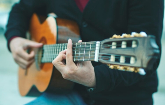 Learn to play guitar from your mobile phone